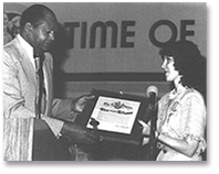 Los Angeles Mayor Tom Bradley awarding Karen a proclamation for Time of Your Life Expo, and her work on behalf of older adults. 